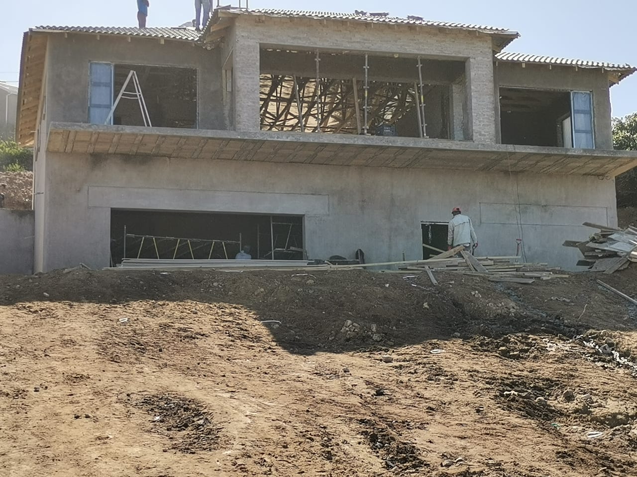 Large home build under plaster and roof installation